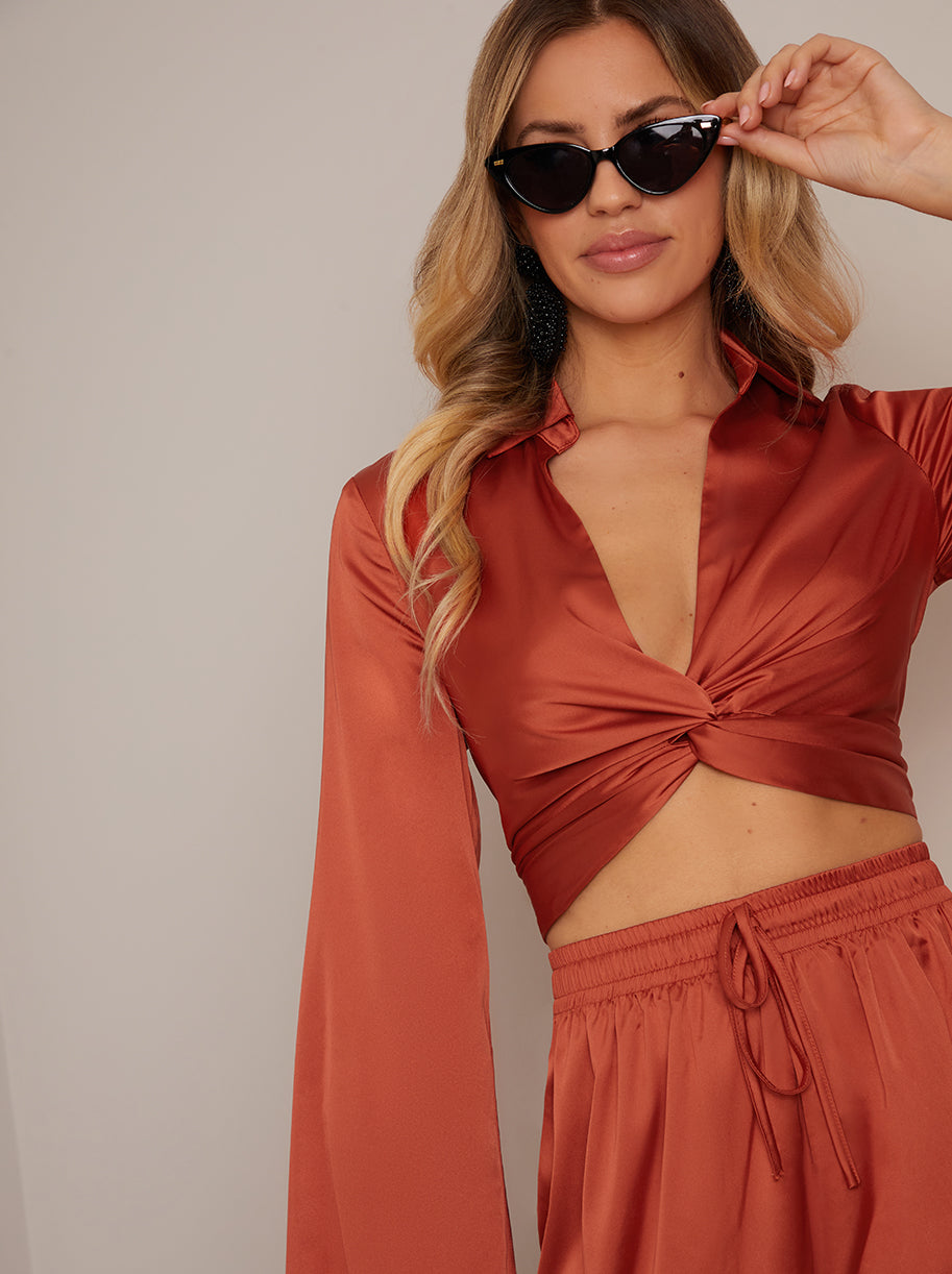 Long Sleeve V Neck Satin Twist Detail Top in Burnt Orange
