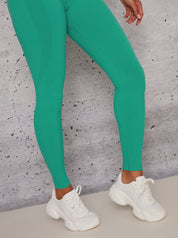 Sports Leggings with Body Contouring Design in Green