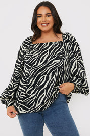 Zebra Woven Balloon Sleeve Blouse