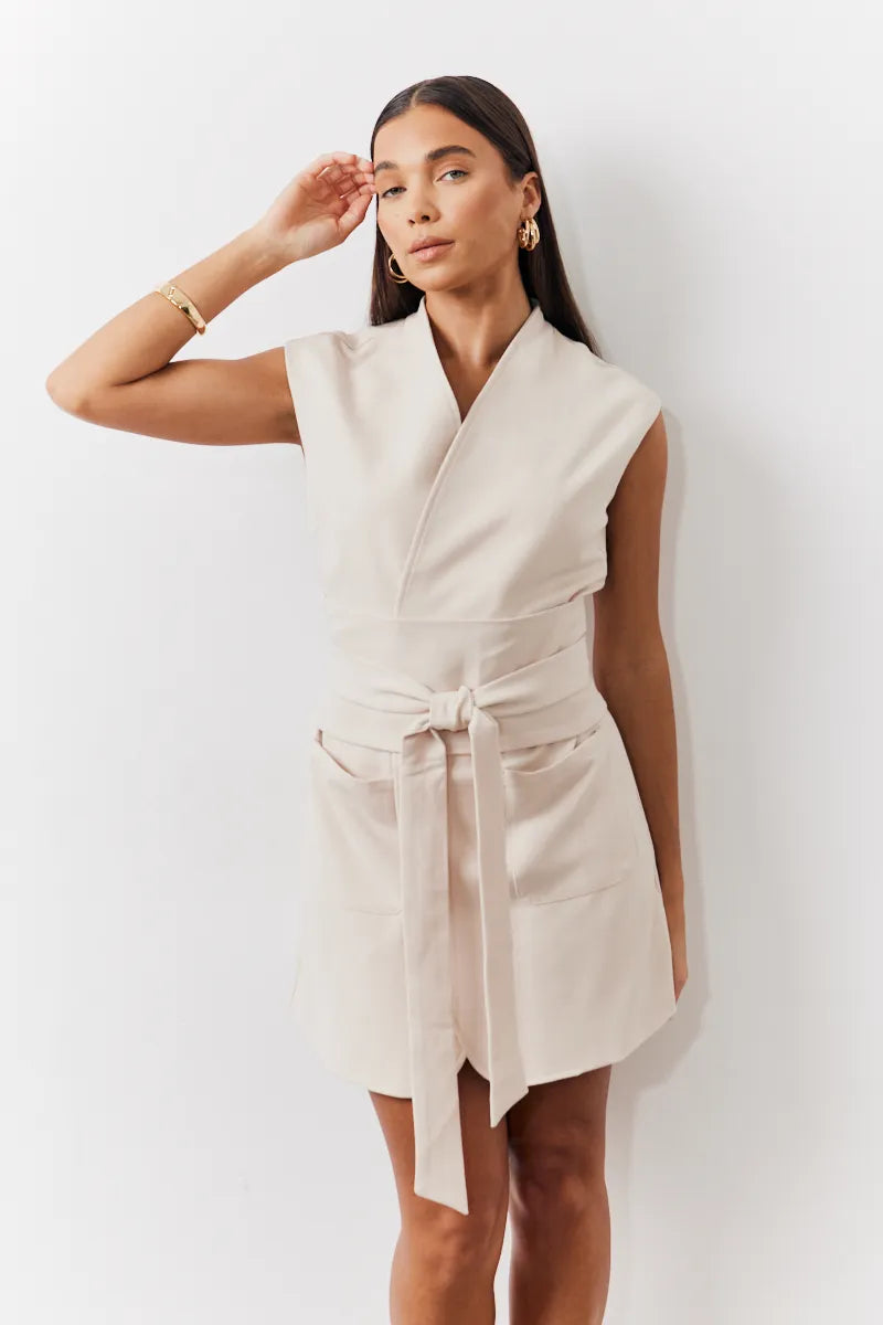 In The Style Structured Pocket Detail Belted Mini Dress in Cream