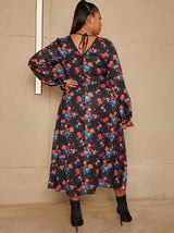 Plus Size Long Sleeve Plunge Floral Printed Midi Dress in Black
