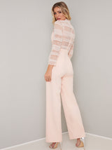 Crochet Bodice Long Sleeved Flared Jumpsuit in Pink